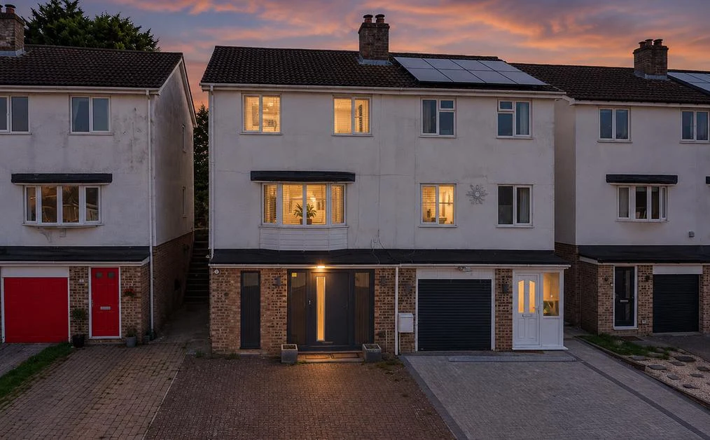 Front of 16 Pine Ridge in Newbury at dusk