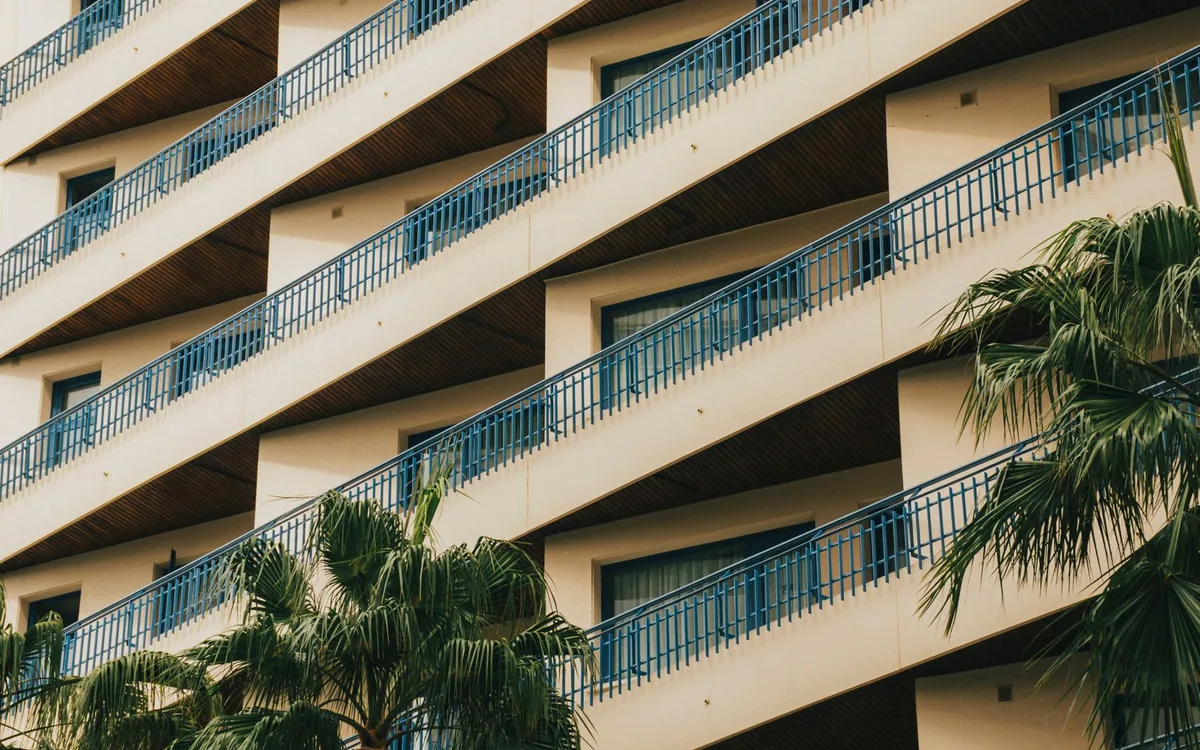Apartment balconies with palm trees in Málaga