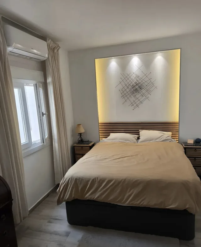 Double bedroom with built-in lighting